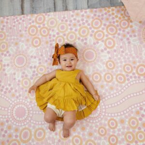 baby play mat in pink and yellow Indigenous art design