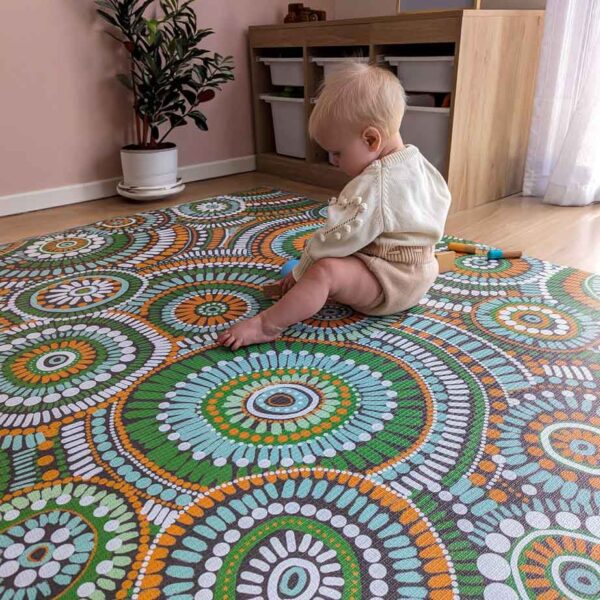 green Aboriginal design baby play mat