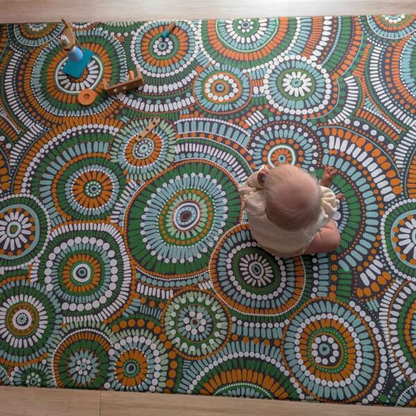 green Aboriginal design baby play mat